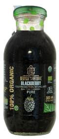 A 300ml glass bottle of George's Natural Blackberry Pure cold-pressed juice, featuring a dark blackberry-colored liquid inside, a green cap, and a black label with green and white text.