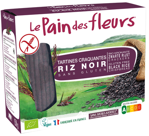Le Pain des Fleurs Black Rice gluten-free crispbread, with the product visible in a box alongside images of rice and the brand logo.