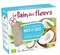 Packaging of Le Pain Des Fleurs Coconut Crispbread with images of coconut and the product name, indicating gluten-free and vegan attributes.